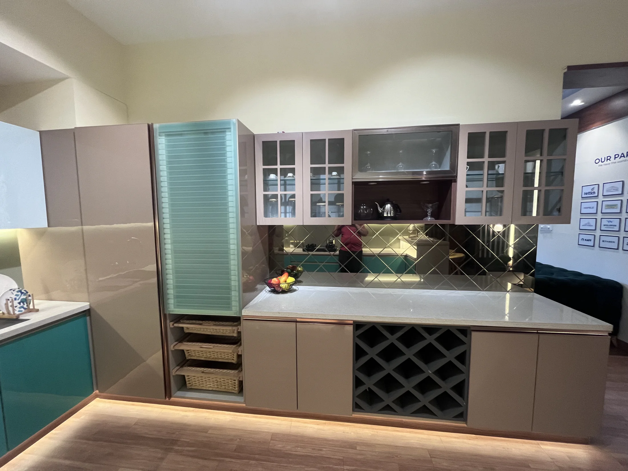 Tall kitchen storage and appliance wall by SK Spaces